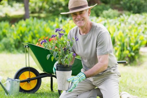 Supervisor checking a landscaping issue before resolution